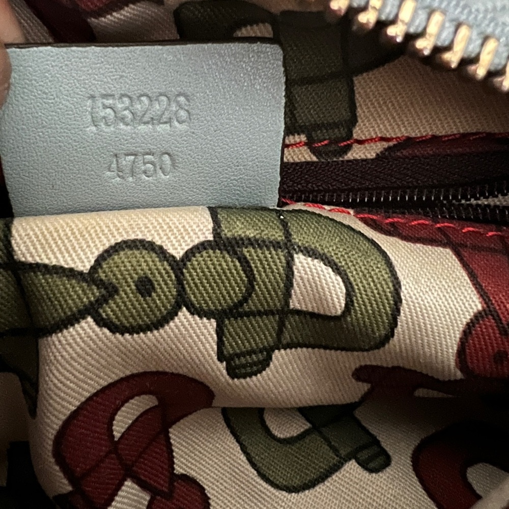 Gucci - authentic cosmetic pouch. Pairs beautifully with my Blue Coach handbag. - Picture 12 of 12